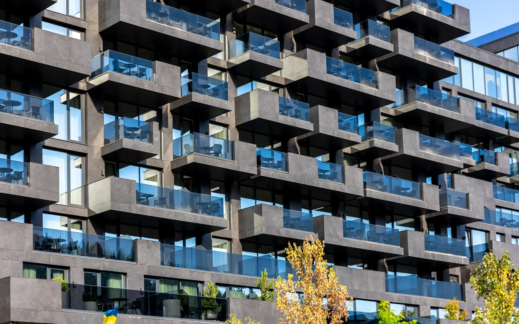 Contemporary apartment buildings with connected balconies